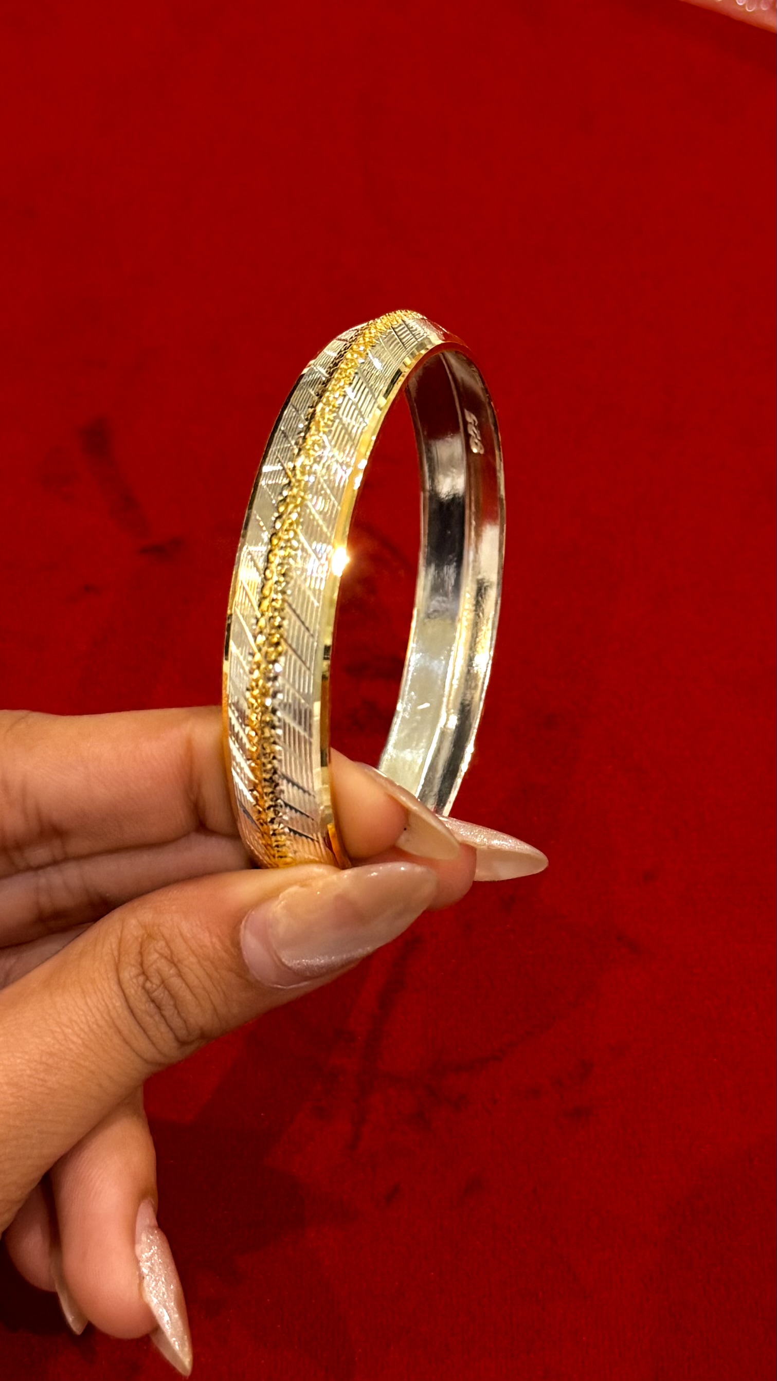 https://www.akirajewellery.com/product/CENTER%20GOLDEN%20DOTTED%20MENS%20SILVER%20KADA