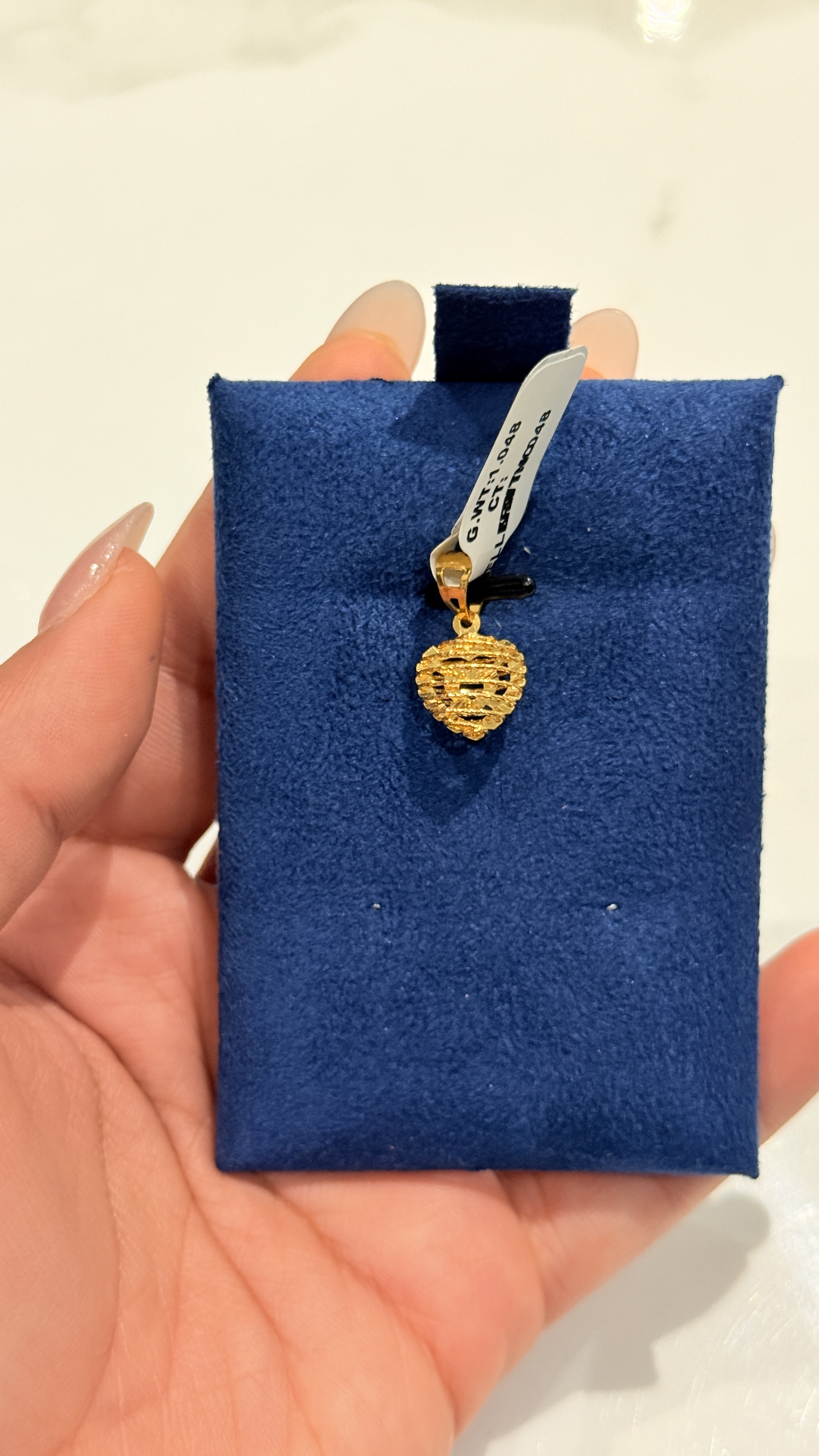 22 k gold pendants 1.048 g